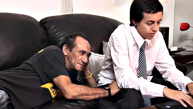 Young Mirko is busy on his computer when his daddy lies on the sofa next to him and makes it clear he wants to play. Soon the young Latino has Ernesto's cock in his mouth and quickly sucks it stiff.