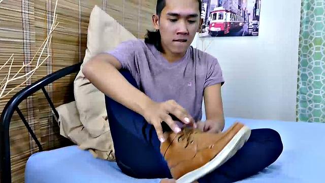 When Freddy is alone and horny, he likes to play with his Asian boy feet. Freddy goes into his room and starts watching a foot fetish video on his smart phone. Already sporting a boner, he strips naked and starts worshiping his own feet.