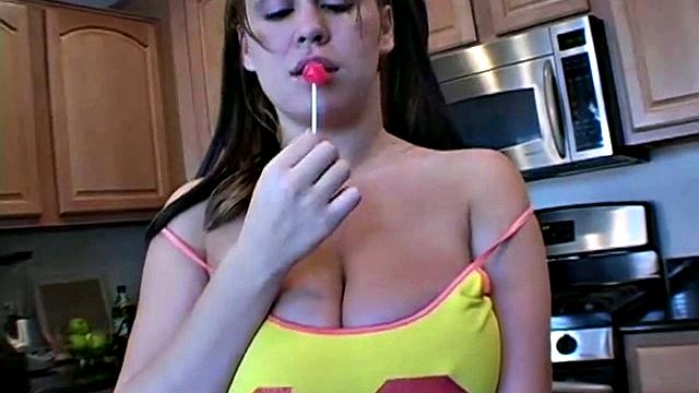 Brandy Tease licks lollipop