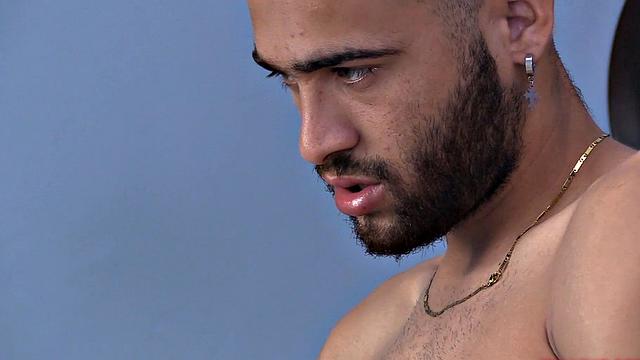 We watch as Ak strips naked and works up a stiff one. Then we are treated to a look at his fine little hairy butt, before the stroke show begins. After beating off, the horny Latino kicks back on a sofa and continues his mission.