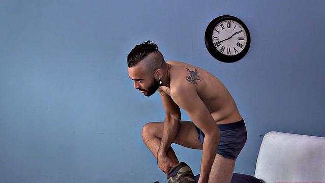 We watch as Ak strips naked and works up a stiff one. Then we are treated to a look at his fine little hairy butt, before the stroke show begins. After beating off, the horny Latino kicks back on a sofa and continues his mission.