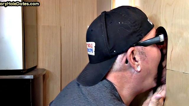 Real gloryhole DILF jerks BFs cock at home