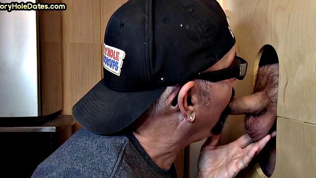 Real gloryhole DILF jerks BFs cock at home