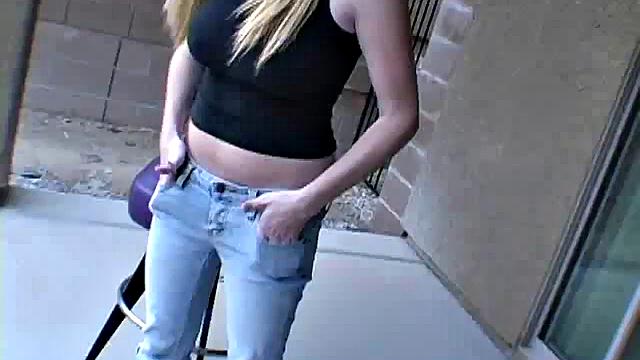 Busty teen teases the camera