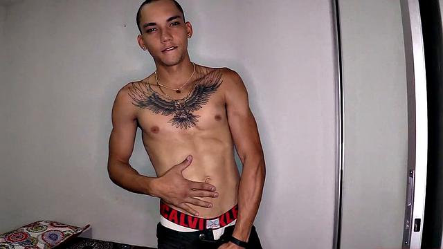 After stripping to his underwear, Kayser kicks back on a bed, revealing a monster cock. He quickly gets hard and starts jerking off.