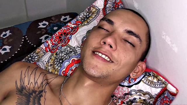 After stripping to his underwear, Kayser kicks back on a bed, revealing a monster cock. He quickly gets hard and starts jerking off.