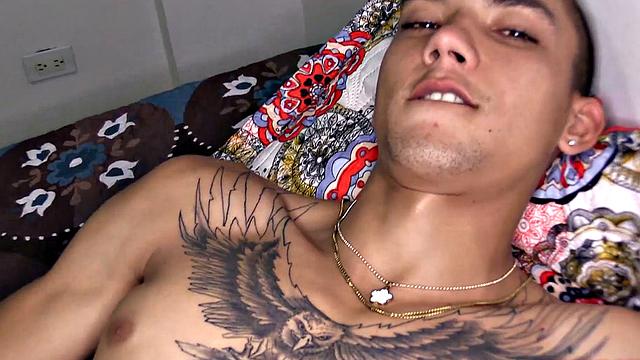 After stripping to his underwear, Kayser kicks back on a bed, revealing a monster cock. He quickly gets hard and starts jerking off.