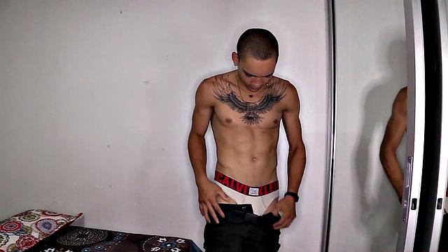 After stripping to his underwear, Kayser kicks back on a bed, revealing a monster cock. He quickly gets hard and starts jerking off.