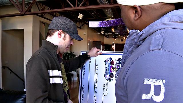 Interracial Africa or Bust! Watch this tattooed babe get her trimmed pussy pounded from behind while giving a handjob and getting a cumshot in her