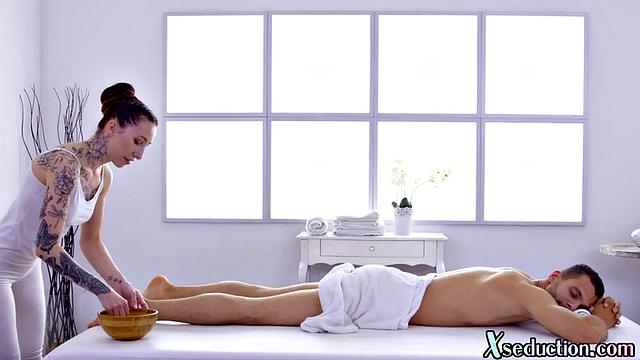 Inked masseuse doggyfucked by client