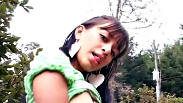 Teen masturbates outdoors