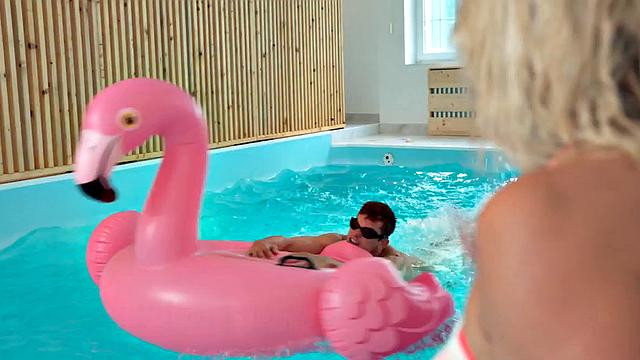 Blonde MILF deepthroating underwater