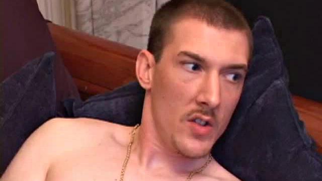 Tough looking Richard Azina hasn't popped his load in a couple of weeks. Dying to release the pressure, he quickly gets naked and stretches out on the sofa. Richard fondles his cock and tugs on his sack, easing his meat to full attention.