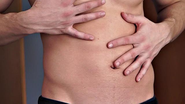 Masked stud masturbates his hard cock in solo action