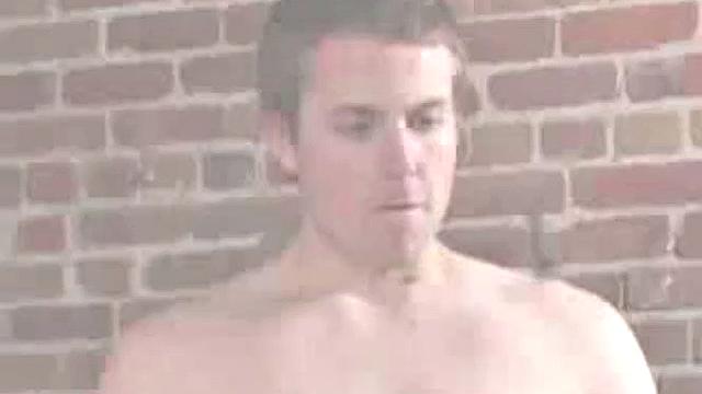 It doesn't take long for Holden Slayer to strip off his clothes and work up a boner. Once hard he strokes his cock and plays with his balls to coax out a huge cum load.