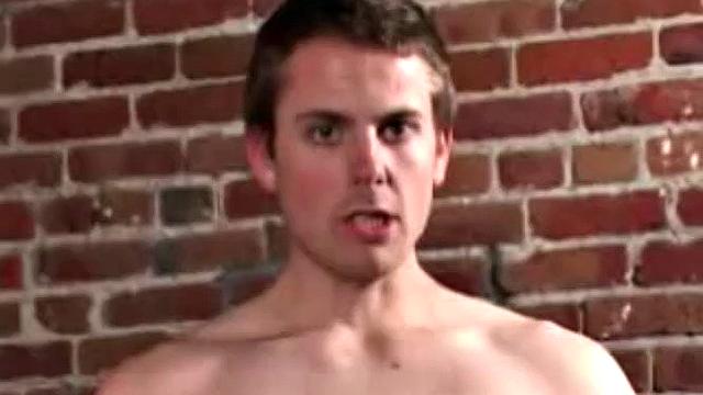 It doesn't take long for Holden Slayer to strip off his clothes and work up a boner. Once hard he strokes his cock and plays with his balls to coax out a huge cum load.