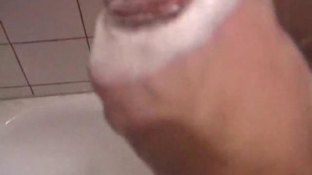 As Dan takes a shower he soaps up his wet naked body and cock, working up a good lather and nice big boner. After edging himself a few times, he's squirting out a monster cum load.