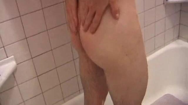 As Dan takes a shower he soaps up his wet naked body and cock, working up a good lather and nice big boner. After edging himself a few times, he's squirting out a monster cum load.