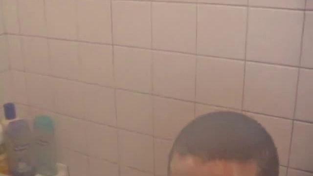 As Dan takes a shower he soaps up his wet naked body and cock, working up a good lather and nice big boner. After edging himself a few times, he's squirting out a monster cum load.