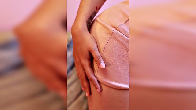 redhead with long hair in pink outfit, seductive