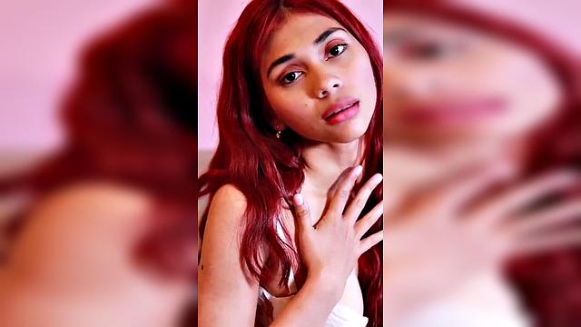 redhead with long hair in pink outfit, seductive