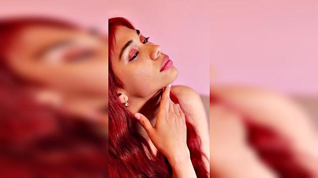 redhead with long hair in pink outfit, seductive