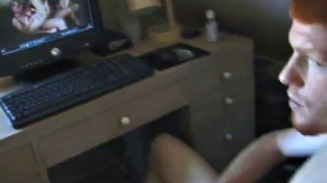 Tristan watches a porn video, while playing with himself, and we enjoy some nice close-ups of his cock and balls