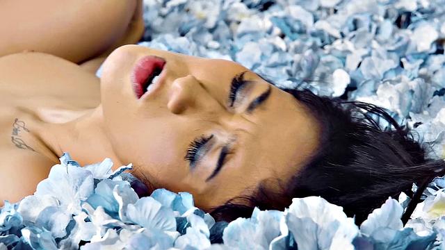 Brunette with a tattoo fucks hard in reverse cowgirl and titjob action