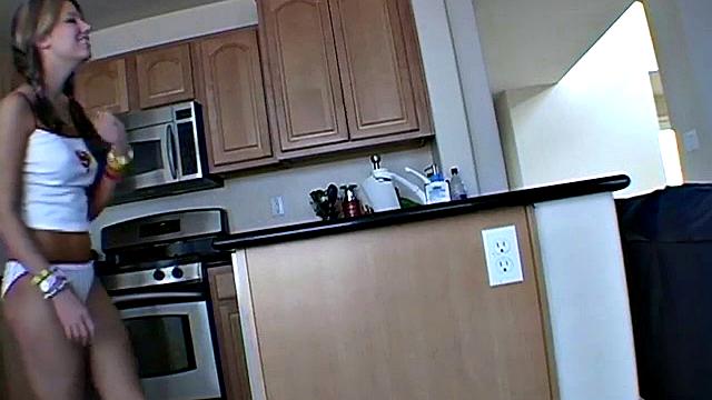 Cutie Kelli strips for the camera