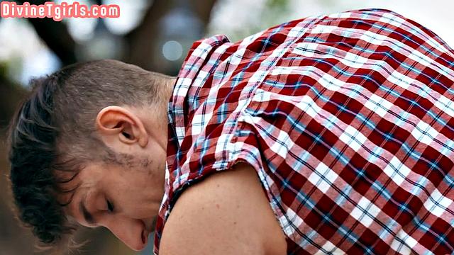 Busty trans deepthroating outdoors