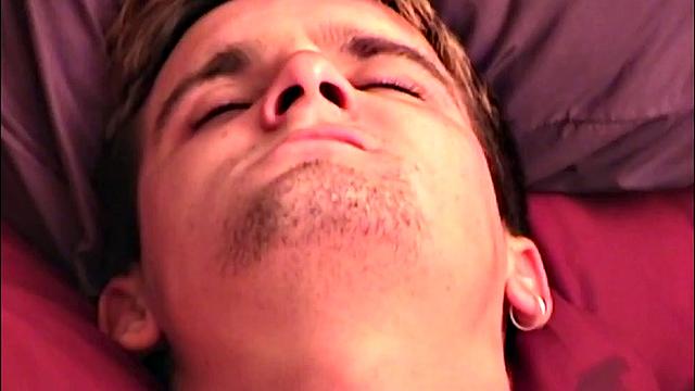 Will is naked on the sofa in front of Auntie Bob's camera for another homemade amateur jerk off video. He strokes his cock and then slides a dildo up his ass for added stimulation.