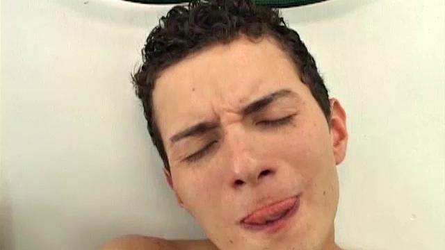 Cute Latin twink Renato is in the store room, where he strips naked and shows his big uncut dick and fine little ass.