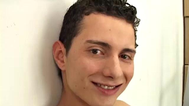 Cute Latin twink Renato is in the store room, where he strips naked and shows his big uncut dick and fine little ass.