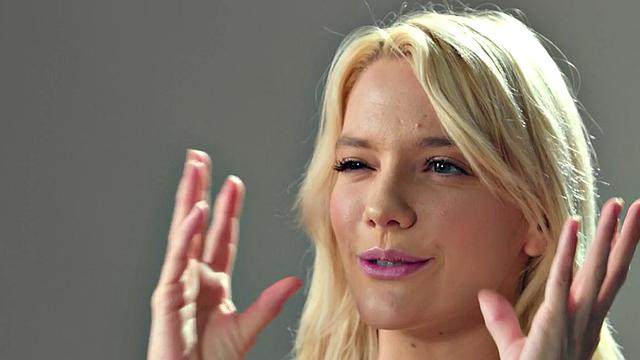 Busty blonde babe fingers pussy