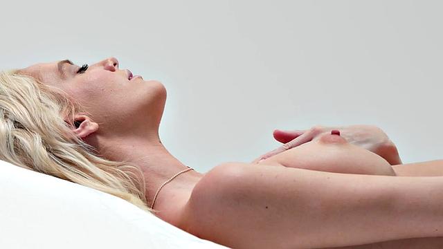 Busty blonde babe fingers pussy