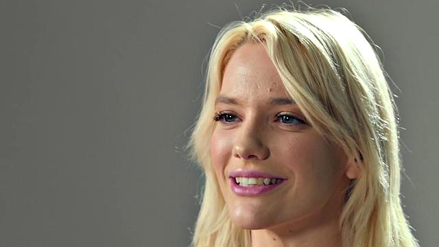 Busty blonde babe fingers pussy