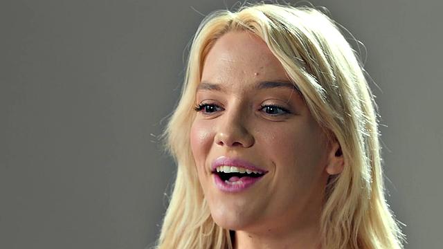 Busty blonde babe fingers pussy