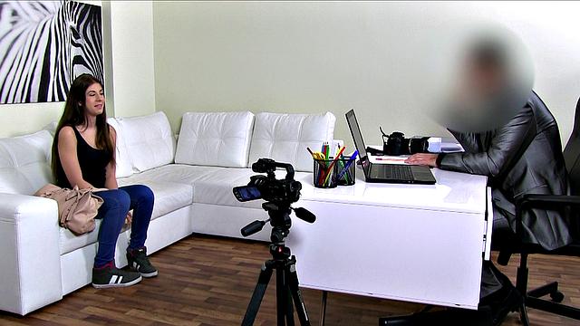 Brunette Gives Blowjob on the Couch