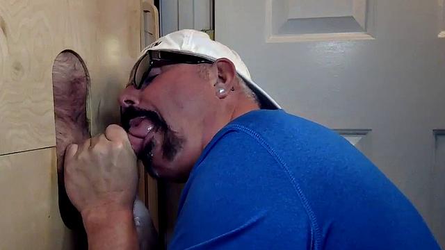 Deepthroating mature breeded from behind at gloryhole