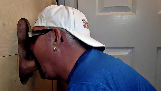 Deepthroating mature breeded from behind at gloryhole