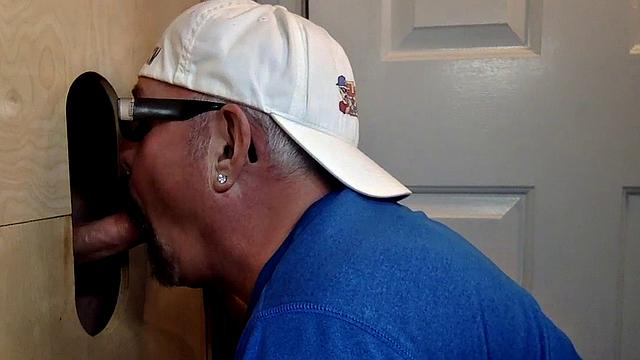 Deepthroating mature breeded from behind at gloryhole