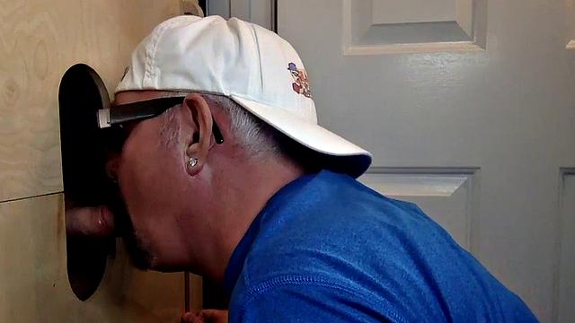 Deepthroating mature breeded from behind at gloryhole