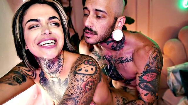 MTF tattooed boy fucks pussy of inked GF with strapon