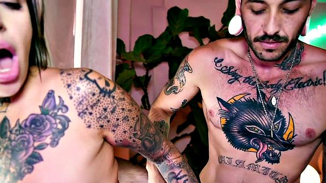MTF tattooed boy fucks pussy of inked GF with strapon