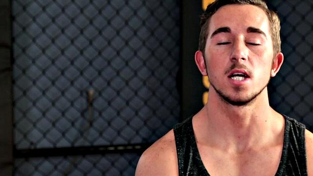 Tattooed stud masturbating in the gym