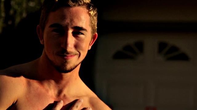 Tattooed stud masturbating in the gym