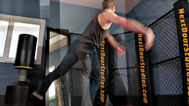 Tattooed stud masturbating in the gym