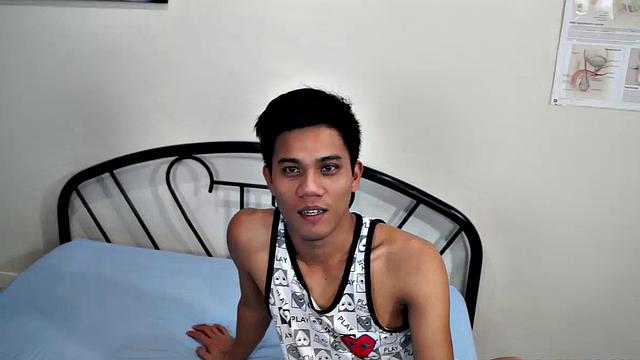 Jacob has his sexy buddy Simon spreadeagled on the bed for some tickling fetish action. Jacob loves tickling so he spends plenty of time on those Asian boy feet. But that's not to say Simon isn't ticklish on his upper body.