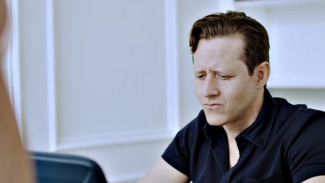 Redhead MILF passionately bounces on young cock