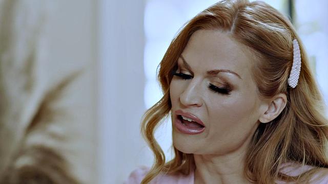 Redhead MILF passionately bounces on young cock